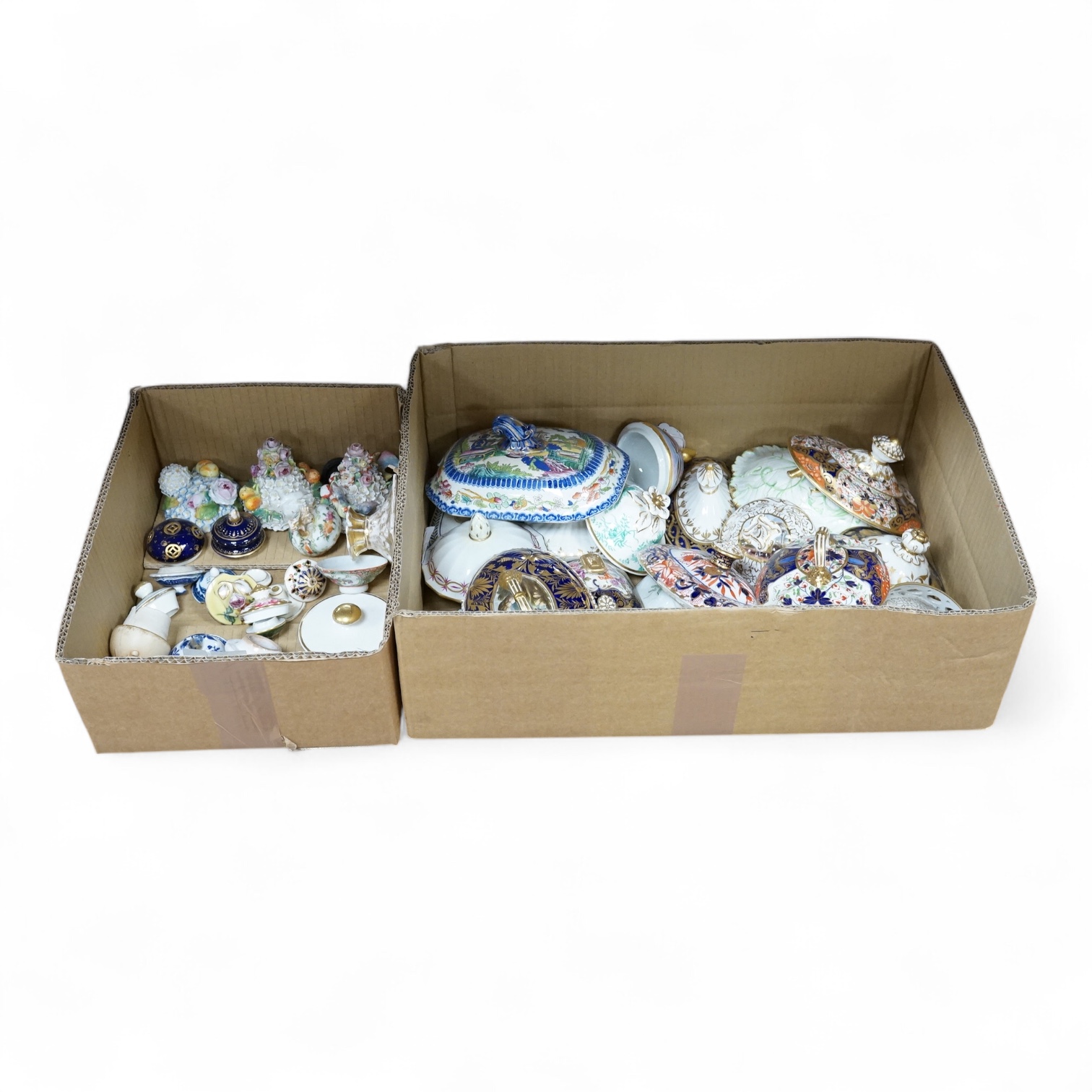 A collection of porcelain tureen and pot covers, largely 19th century